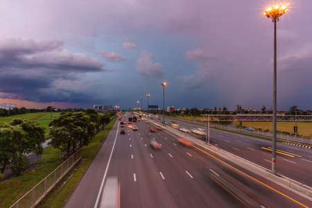 Storm clouds over highwayの写真素材