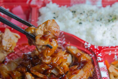 Japan Food of Grilled chicken teriyaki rice in a box.の写真素材