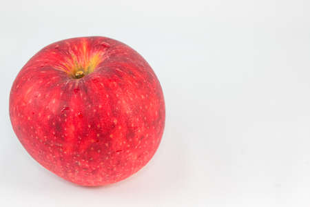 Red ripe apple on white background  blank space for text.の写真素材