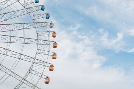 Half of the Ferris wheel against sky.の写真素材