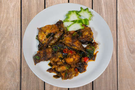 phad pla duk krob stir fried deep fried catfish with curry paste, thai food.の写真素材
