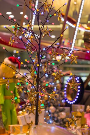 Christmas holiday blinking abstract background with decorated christmas tree.の写真素材