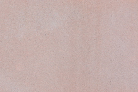 Texture of soft pink color gravel concrete wall.の写真素材