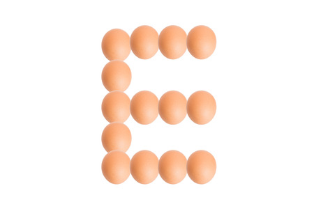 E,Egg alphabet uppercase on white background.の写真素材