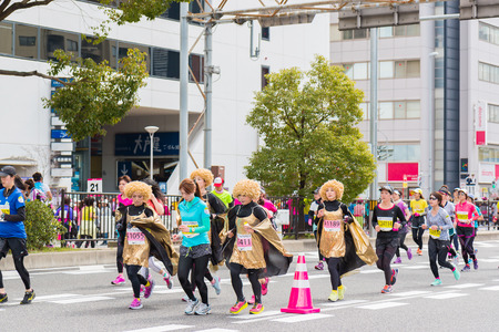 NAGOYA, JAPAN - MARCH 13, 2016: Nagoya Women's Marathon 2016. Women's With more than 3,000 People running in the downtown. Course Start and finish at Nagoya Dome Distance 42.195km. Nagoya city Japan.のeditorial素材