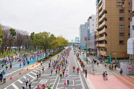 NAGOYA, JAPAN - MARCH 13, 2016: Nagoya Women's Marathon 2016. Women's With more than 3,000 People running in the downtown. Course Start and finish at Nagoya Dome Distance 42.195km. Nagoya city Japan.のeditorial素材