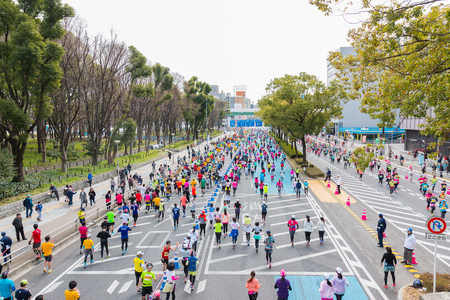 NAGOYA, JAPAN - MARCH 13, 2016: Nagoya city Marathon 2016. People running in the downtown.Half Marathon and Quarter Marathon. Nagoya city Japan.のeditorial素材