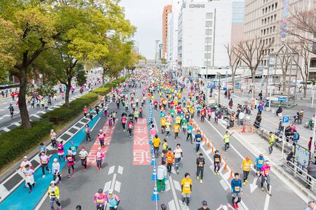NAGOYA, JAPAN - MARCH 13, 2016: Nagoya city Marathon 2016. People running in the downtown.Half Marathon and Quarter Marathon. Nagoya city Japan.のeditorial素材