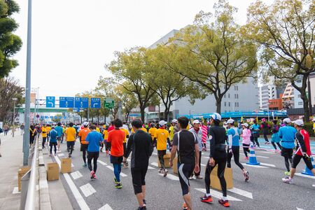 NAGOYA, JAPAN - MARCH 13, 2016: Nagoya city Marathon 2016. People running in the downtown.Half Marathon and Quarter Marathon. Nagoya city Japan.のeditorial素材