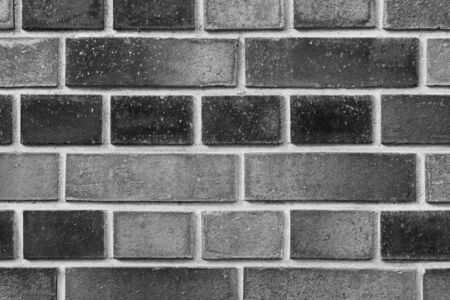 Black brick wall texture for background. Traditional ancient wall.の写真素材