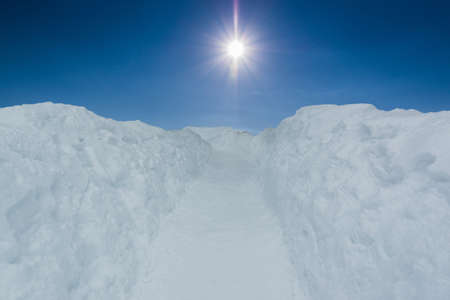 Beautiful snow walkway with sky, wonderful winter.の写真素材