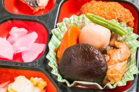 Japan Food set of steamed Chicken and other in a box. Japan food (Bento).の写真素材