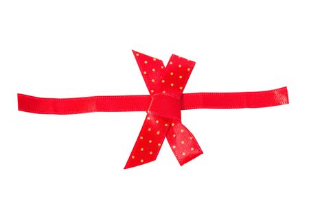 Red ribbon bow decoration isolated on white. Object with clipping pathの写真素材