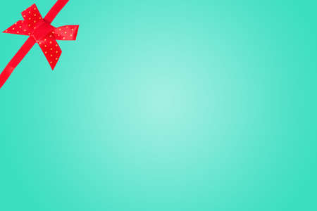 elegant blue background with red bow frame.の写真素材
