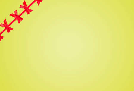elegant yellow background with red bow frame.の写真素材