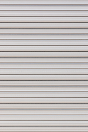 White metal roller door shutter background and textureの写真素材