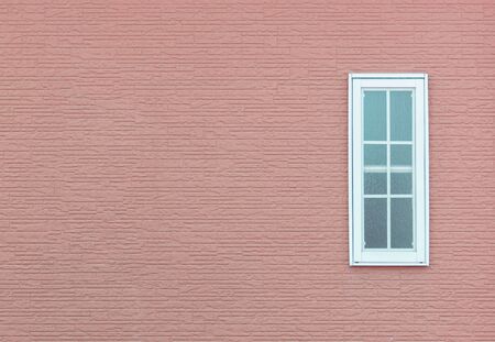Modern windows and Detail of house exterior red wall.の写真素材