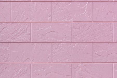 pink concrete brick wall pattern texture for background.の写真素材