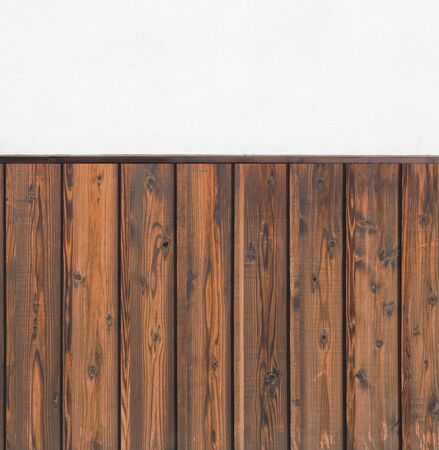 Wooden plank against white concrete wall. concept banner background.の写真素材
