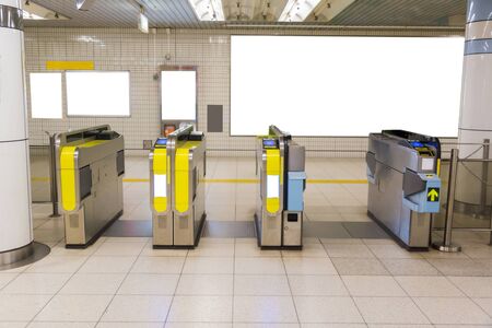 Automatic entrance of subway with empty white board.の写真素材