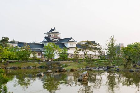 Toyama castle historic landmark in toyama city japan with beautiful garden and reflection in water.のeditorial素材