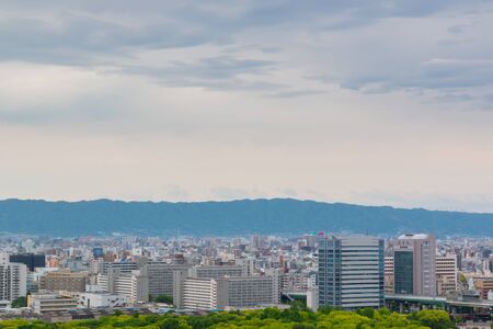 Cityscape and Skyline of Osaka city in Japan, view from osaka castle.