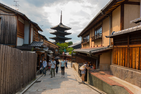 KYOTO, JAPAN - July 31, 2016: The tourist walking in higashiyama, the old streets of Kyoto, with Yasaka pagoda in the background scene.のeditorial素材