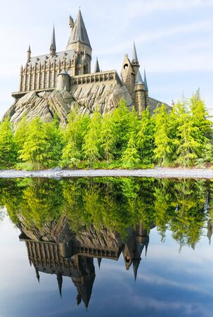 OSAKA, JAPAN - May 5, 2016: Universal Studios Japan (USJ). located in Osaka. Beautiful reflection in water of Hogwarts School of Witchcraft and Wizardry in Harry Potter.のeditorial素材