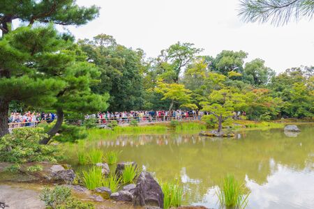 KYOTO, JAPAN - July 31, 2016: The Tourists visit Kinkaku-ji temple  It is a Zen Buddhist temple in Kyoto, Japan. the garden complex is an excellent example of Muromachi period garden design.のeditorial素材