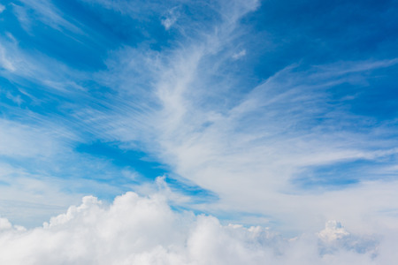 Bright sky blue background. Sky in daylight with beautiful white cloud, can be use for background.