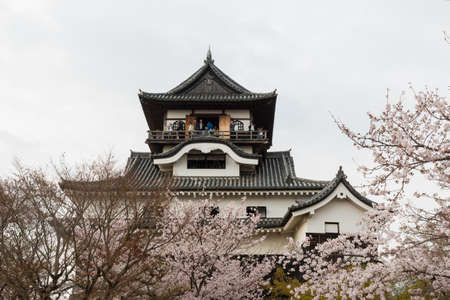 Inuyama, Japan - 2 April 2016: Inuyama castle historic building landmark in spring with beautiful...