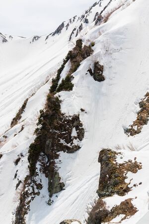 Tateyama Kurobe Alpine Route and Beautiful landscape the snow mountains view on Tateyama Japanese...