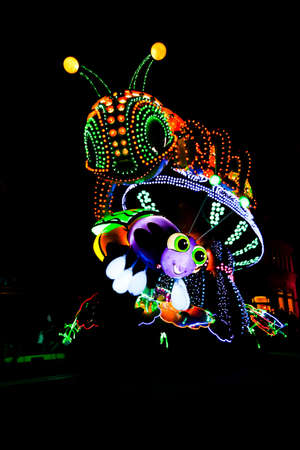 OSAKA, JAPAN - May 5, 2016: Universal Studios Japan (USJ) 
Beautiful illumination event night parade. Most visitors are Japanese tourists and tourists from other Asian countries.のeditorial素材