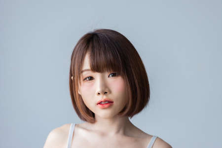 Portrait asian young woman wearing sexy bikini in bedroom. Sexy girl concept.の写真素材