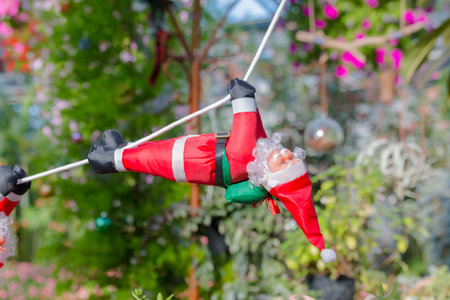 Santa Claus figurine decoration in garden. Concept christmas background without people.の写真素材