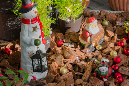 Santa Claus figurine decoration in garden. Concept christmas background without people.の写真素材