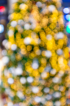Abstract light of christmas tree celebration blur background with defocused lights.の写真素材