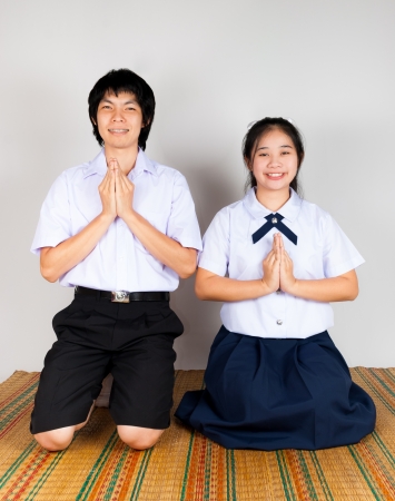 Lovers Of High School Asian Thai Students are paying obeisanceの写真素材