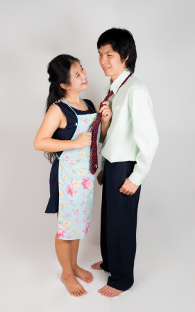 Wife ties husbandの写真素材