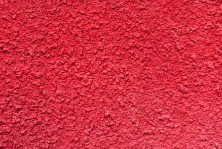 Red Rough Concrete Wall Backgroundの写真素材