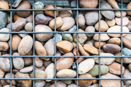 Meshed Metal and Rock Wall Backgroundの写真素材