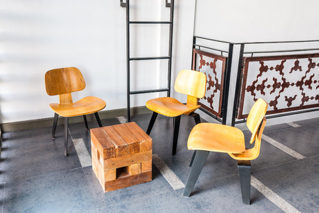 Wooden Chairs and Table in Relaxing Areaの写真素材