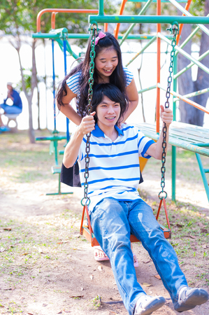 Sweet Cute Couple Relaxing in Parkの写真素材