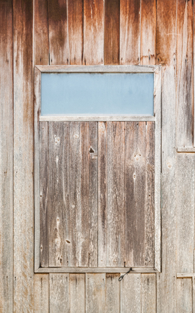 Closed Old Dirty Wood Window with Frosted Glassの写真素材