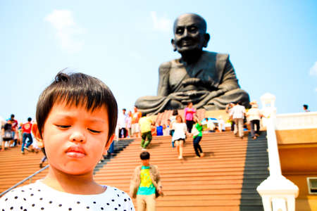 Little boy travel with family to place of worshipの写真素材