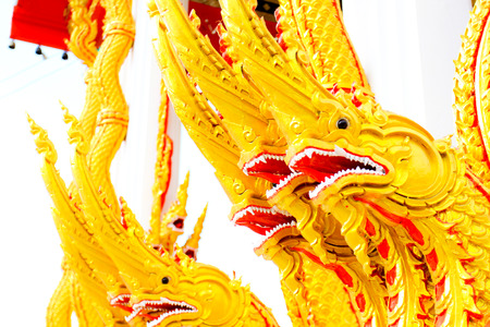 Beautiful plaster cherub detail with gold leaf scallop and oak leaves,
 all part of architectural decorationsの写真素材