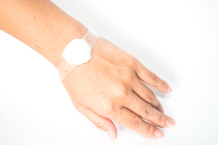 single hand drip receiving a saline solution