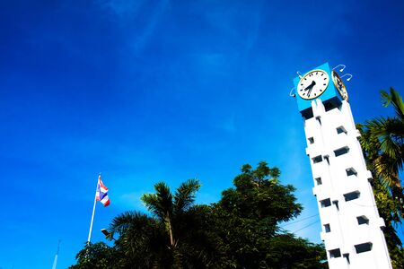 Tower clock on the blue skyの写真素材