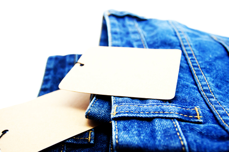 blue jeans back pocket isolated on the white backgroundの写真素材