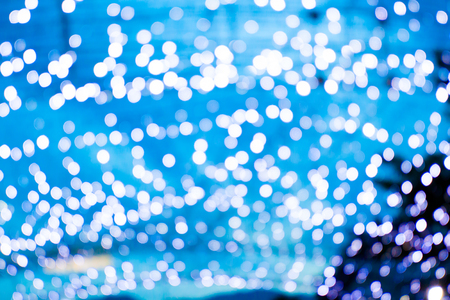 Defocused abstract blue lights background, bokeh lights wall conceptの写真素材